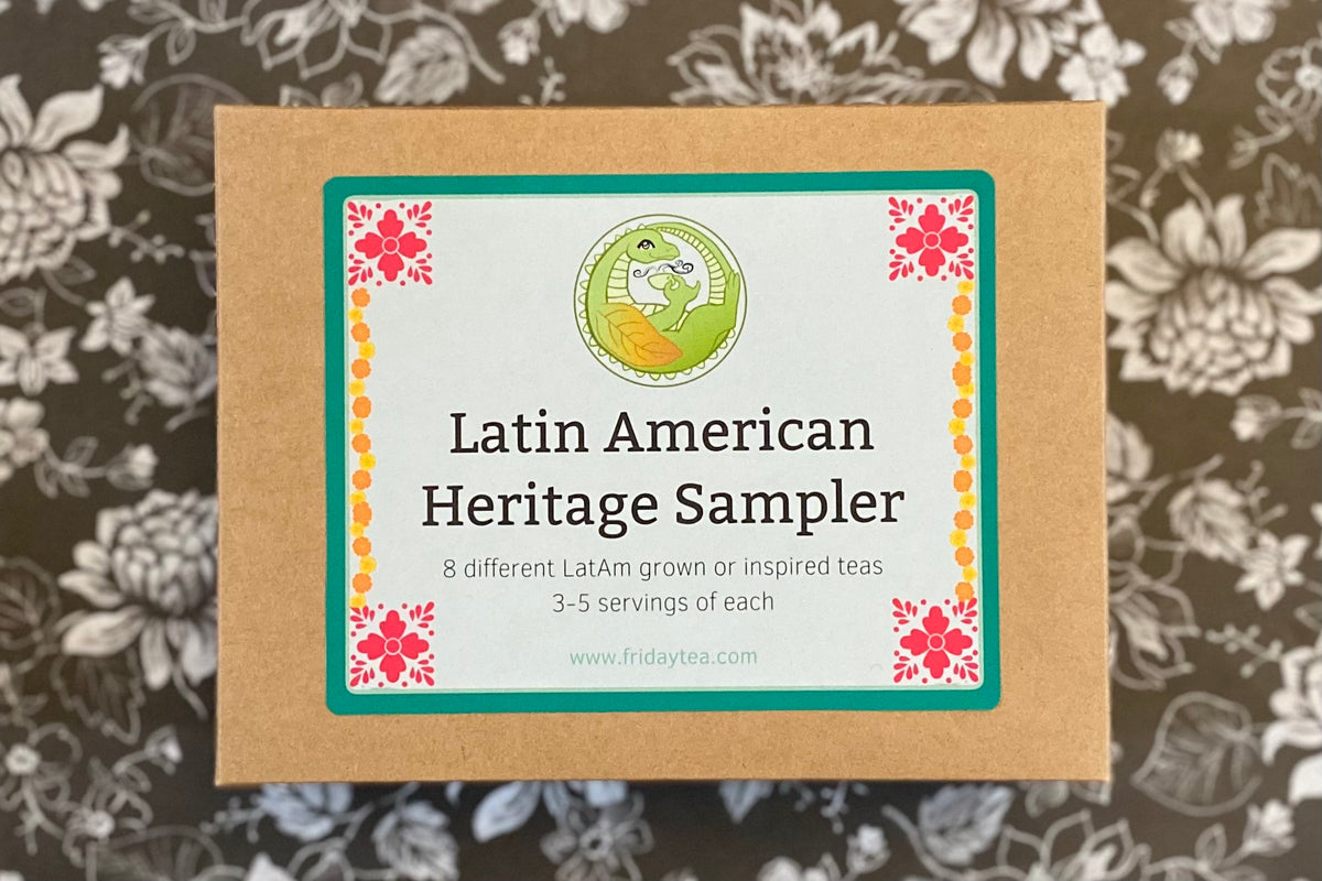 Tea sampler box labeled 'Latin American Heritage Sampler' on a floral background
