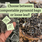 Photo of teabags beside bowl of loose leaf with text "choose between compostable pyramid bags or loose leaf!"