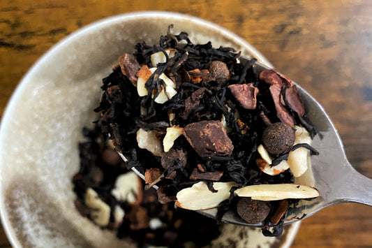 A scoop of black tea with spices, almond, and chocolate