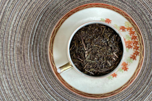 teacup full of brown twiggy leaf