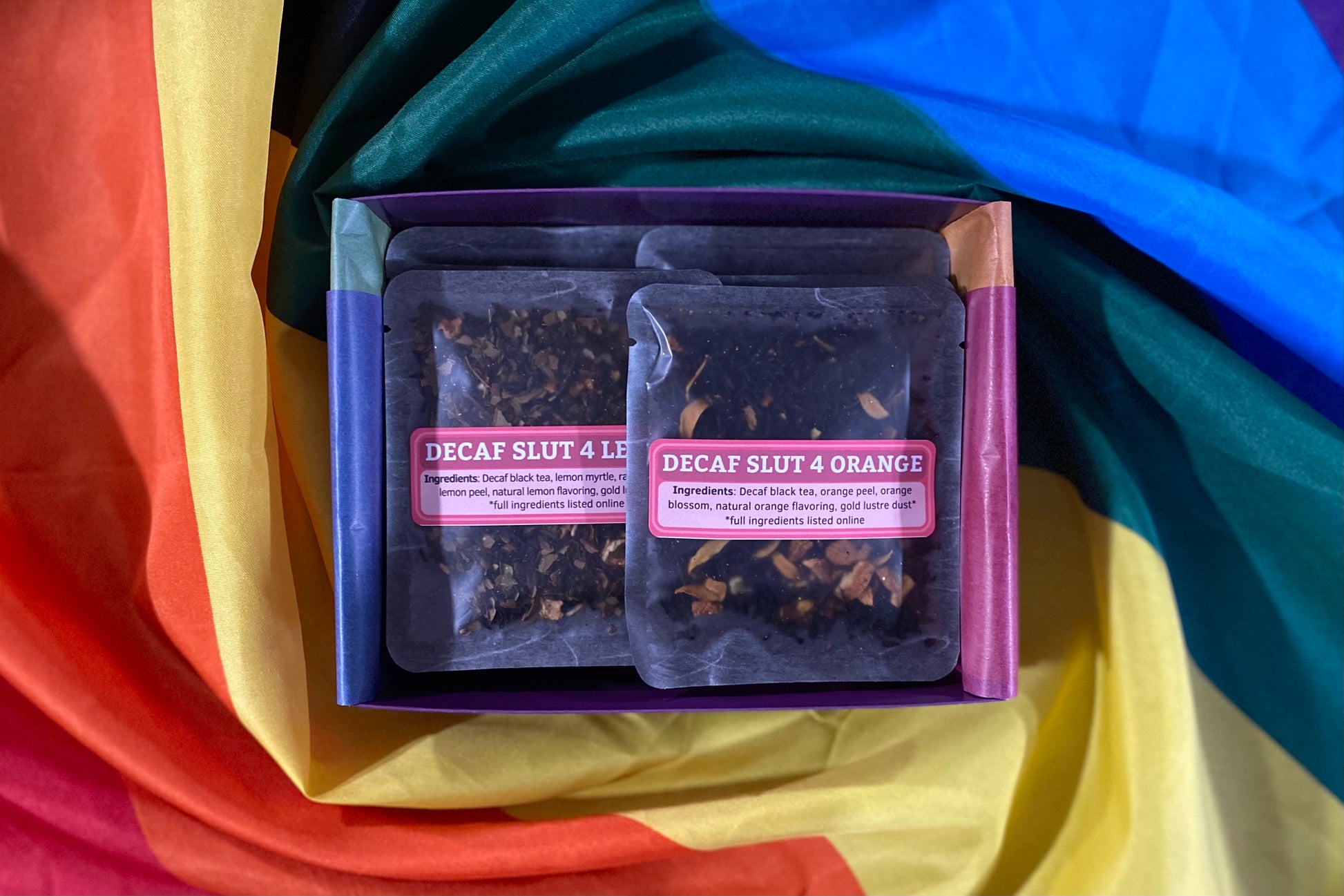 An open box showing Decaf Slutty Fruit teas