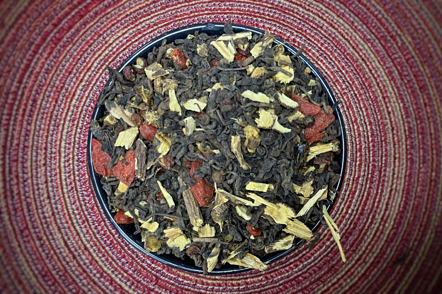 a cup of loose tea leaves