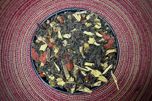 a cup of loose tea leaves